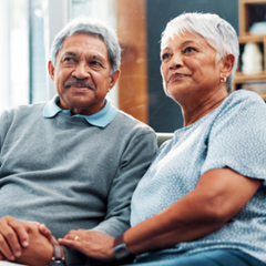 A man and a woman sit together