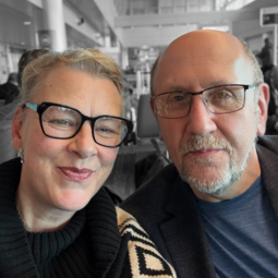 Two people sit together 