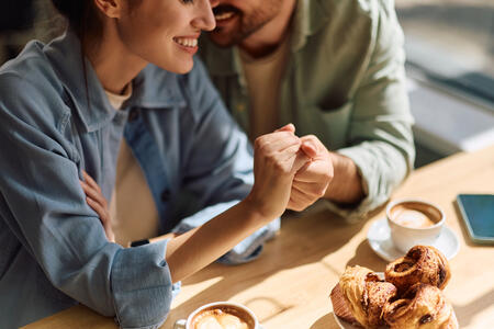 Couple holding hands